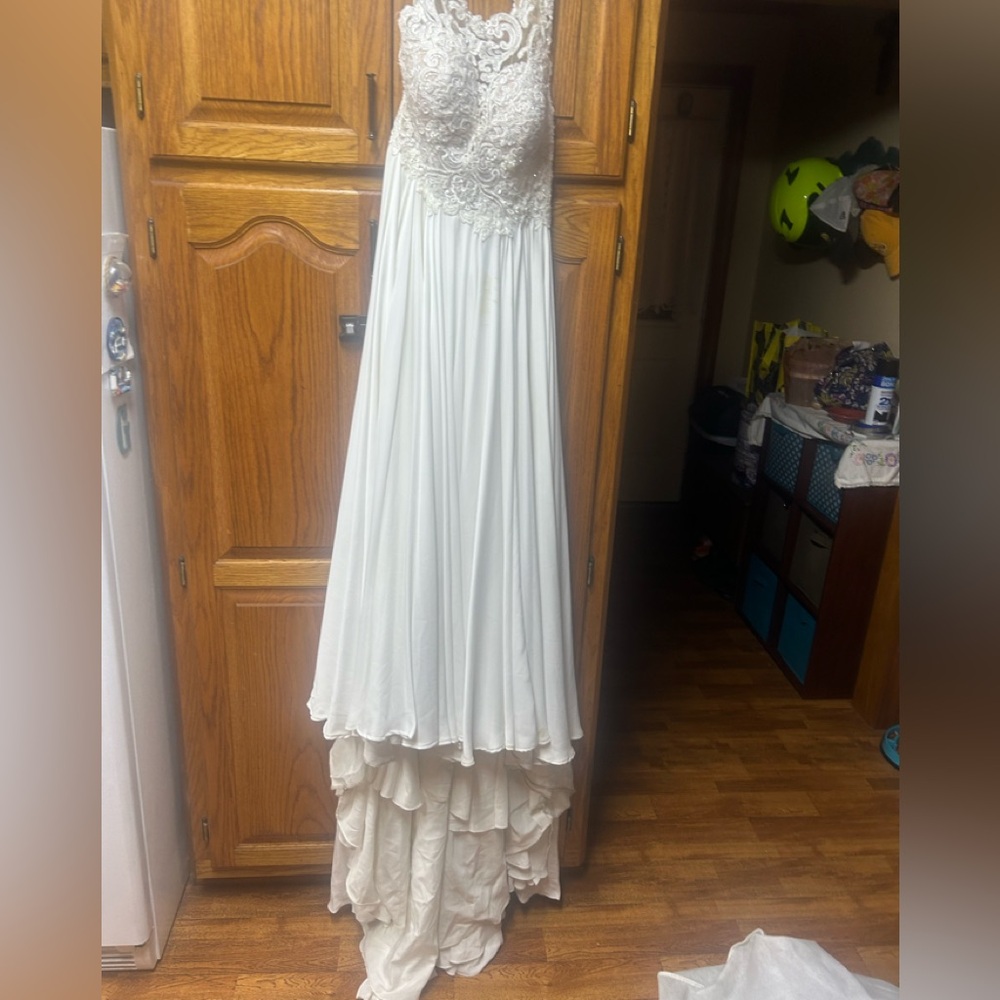 Essense 12 ivory wedding dress 
See description. Open to offers.